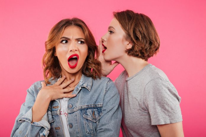 shocked-two-women-friends-gossiping